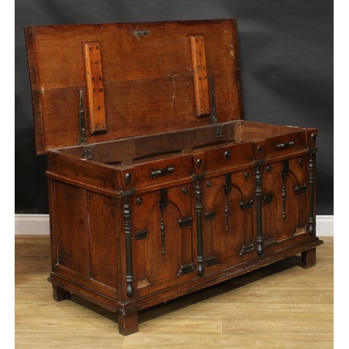 1999 - An 18th century oak and parcel-ebonised blanket chest, possibly Flemish, hinged top above a three pa... 