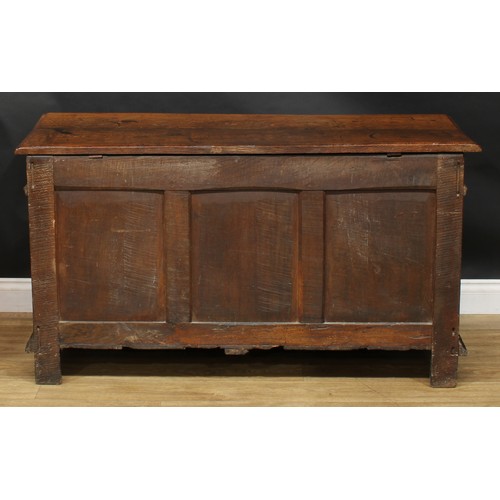 1999 - An 18th century oak and parcel-ebonised blanket chest, possibly Flemish, hinged top above a three pa... 