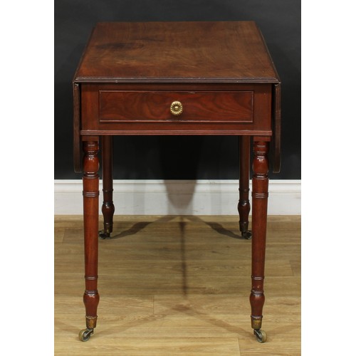 2360 - A Regency mahogany Pembroke table, rounded rectangular top with reeded edge and fall leaves above a ... 