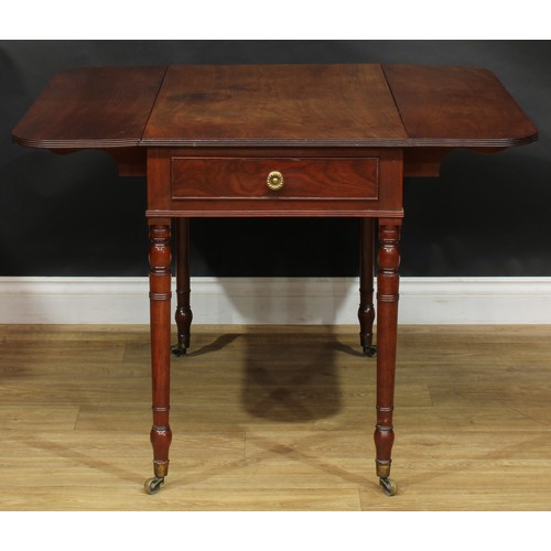 2360 - A Regency mahogany Pembroke table, rounded rectangular top with reeded edge and fall leaves above a ... 