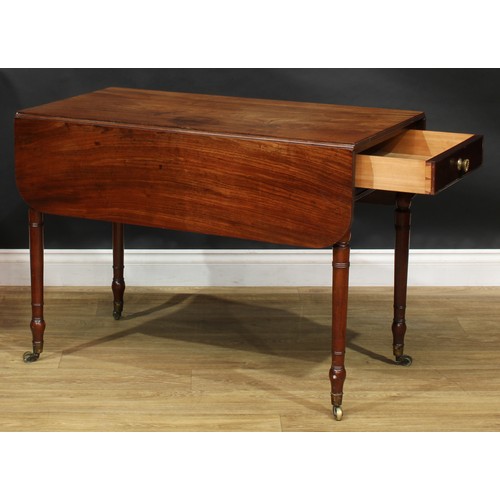 2360 - A Regency mahogany Pembroke table, rounded rectangular top with reeded edge and fall leaves above a ... 