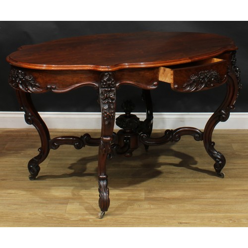 2598 - A Victorian rosewood centre table, serpentine oval top above a frieze drawer, the verso conforming, ... 