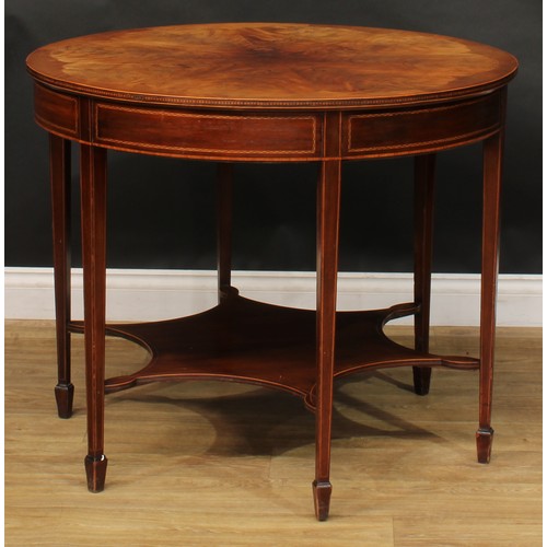 2696 - An Edwardian mahogany centre table, circular top with radiating flame veneers and parquetry edge abo... 