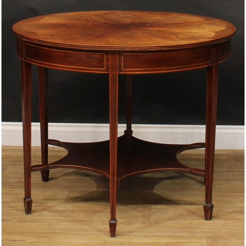 2696 - An Edwardian mahogany centre table, circular top with radiating flame veneers and parquetry edge abo... 