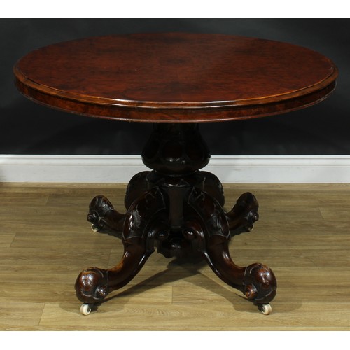 2287 - A Victorian walnut centre table, oval tilting top, turned column, cabriole legs, ceramic casters, 73... 