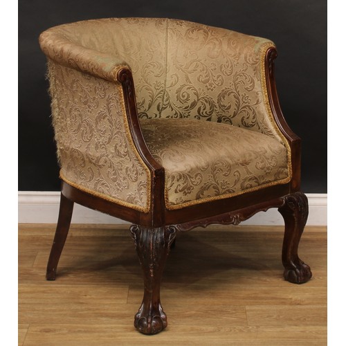 2108 - A George II style club elbow chair, stuffed-over upholstery, shaped apron, cabriole forelegs carved ... 