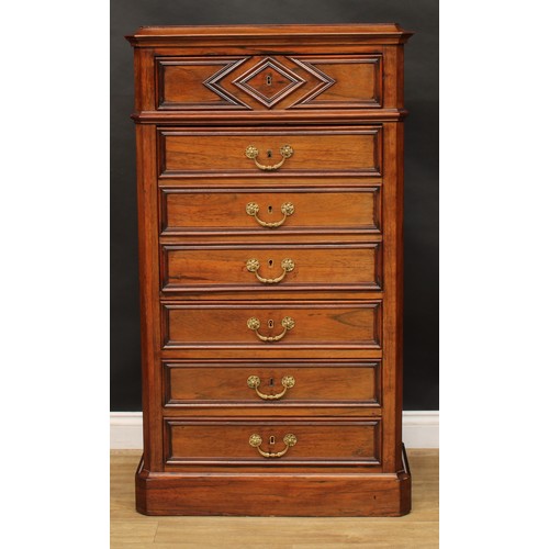 1833 - A late 19th century rosewood secrétaire à abattant, slightly oversailing top above an arrangement of... 