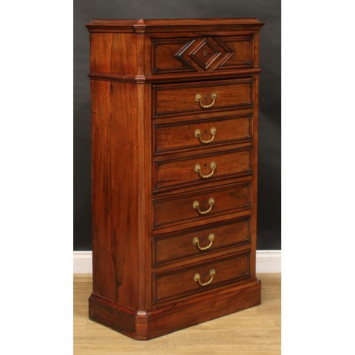 1833 - A late 19th century rosewood secrétaire à abattant, slightly oversailing top above an arrangement of... 