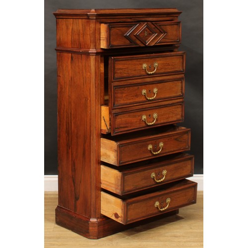 1833 - A late 19th century rosewood secrétaire à abattant, slightly oversailing top above an arrangement of... 