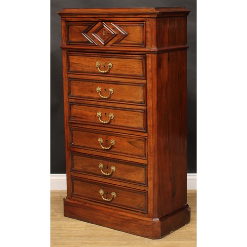 1833 - A late 19th century rosewood secrétaire à abattant, slightly oversailing top above an arrangement of... 