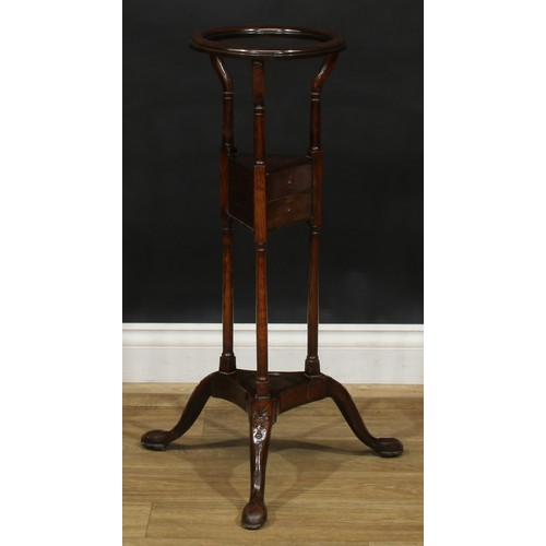 1710 - A 19th century mahogany wig stand, 79cm high, the top 26.5cm diameter