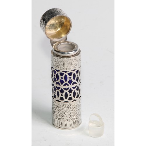 1001 - A late Victorian silver and blue glass smelling salts bottle, engraved with flowers and leaves, hing... 