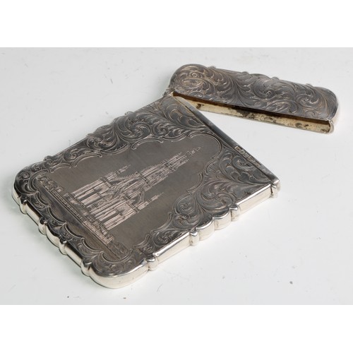 1104 - A Victorian silver shaped rectangular castle top visiting card case, engraved with a view of the Sco... 