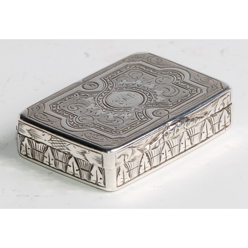 1100 - A Victorian silver rounded rectangular vinaigrette, hinged cover bright-cut engraved with strapwork,... 