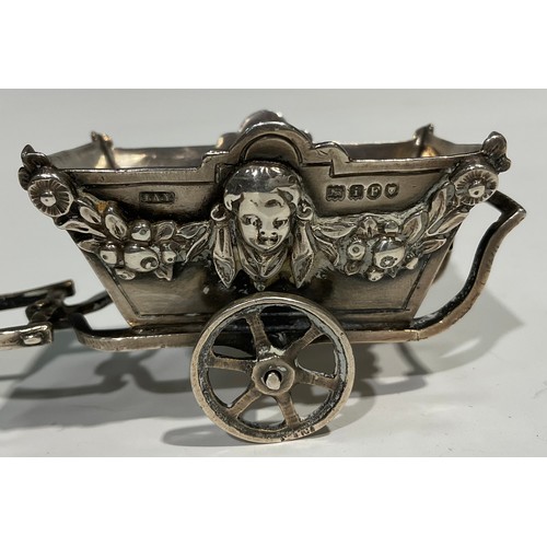 868 - A Continental cast silver miniature model, of a goat and cart, 11.5cm long, import mark for London 1... 