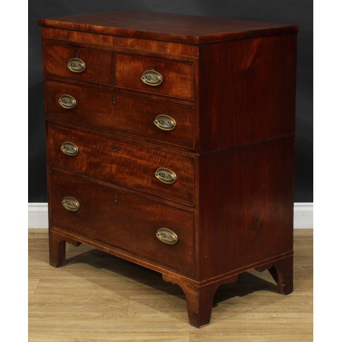 2491 - A George IV mahogany split chest, slightly oversailing top above two short and three long graduated ... 