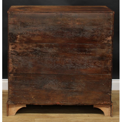 1942 - A George III oak chest, rectangular top with reeded edge above two short and three long graduated dr... 