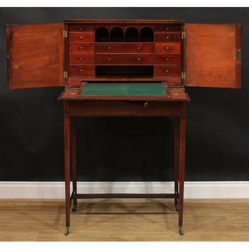 1788 - A George III mahogany campaign cheveret desk or bonheur du jour, rectangular top above a pair of doo... 