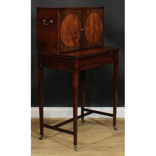 1788 - A George III mahogany campaign cheveret desk or bonheur du jour, rectangular top above a pair of doo... 