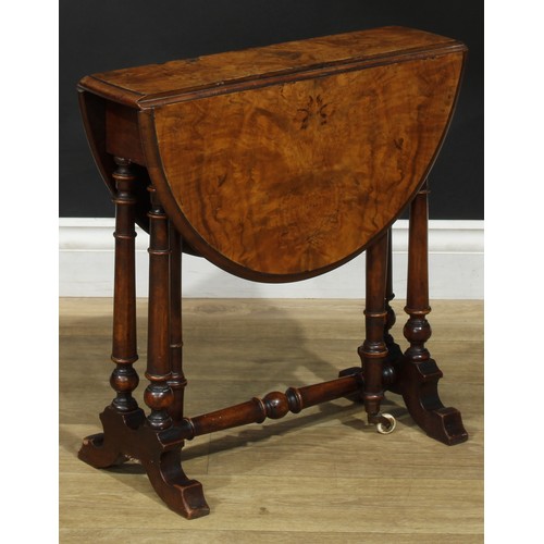 2297 - A Victorian walnut Sutherland table, of small proportions, oval top with fall leaves, turned support... 