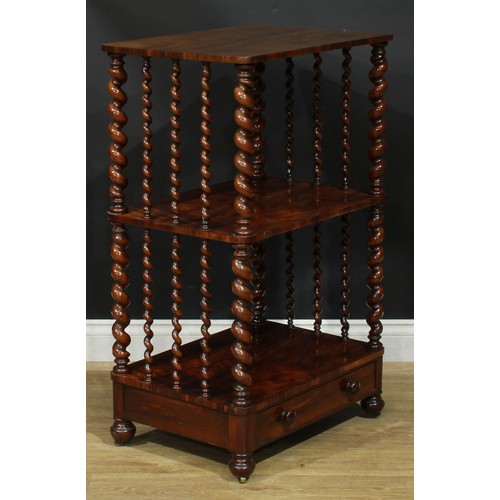 2263 - A Victorian goncalo alves three-tier whatnot, rounded rectangular plateaux, spirally turned supports... 