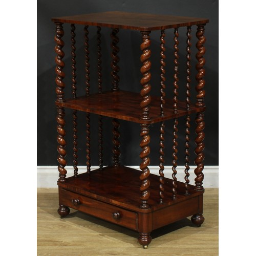 2263 - A Victorian goncalo alves three-tier whatnot, rounded rectangular plateaux, spirally turned supports... 