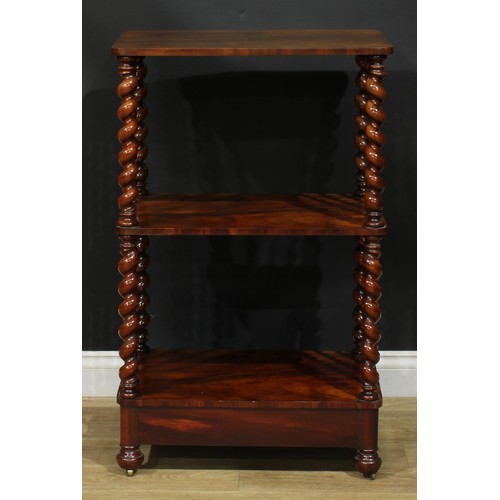 2263 - A Victorian goncalo alves three-tier whatnot, rounded rectangular plateaux, spirally turned supports... 