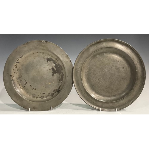 1811 - A pair of 18th century pewter plates, Edgar & Son, 30.5cm diameter; a large 18th century pewter meas... 