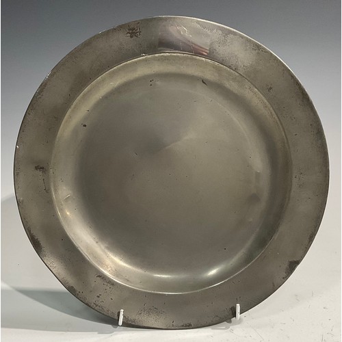 1811 - A pair of 18th century pewter plates, Edgar & Son, 30.5cm diameter; a large 18th century pewter meas... 