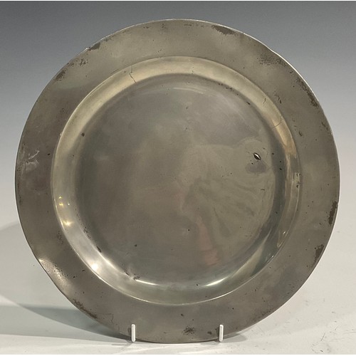 1811 - A pair of 18th century pewter plates, Edgar & Son, 30.5cm diameter; a large 18th century pewter meas... 