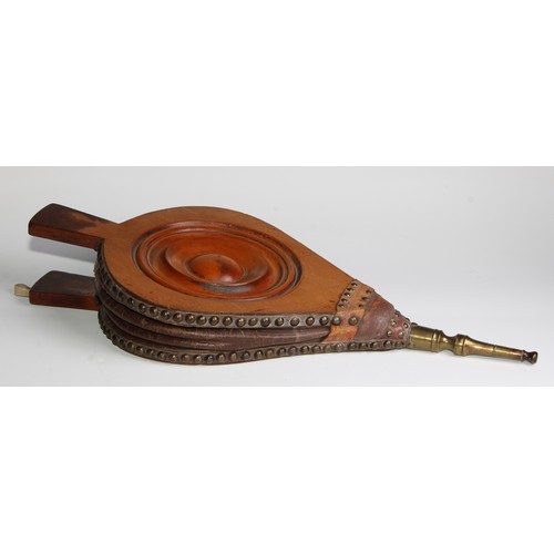 2745 - Treen - a pair of 19th century bellows, centred by a draught-turned roundel, brass spout, 55cm long,... 