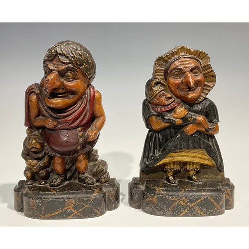 1813 - A pair of 19th century cold painted cast iron Punch and Judy doorstops, Punch dressed as a Roman and... 