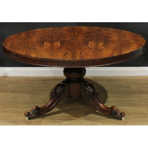 2596 - A Victorian rosewood and mahogany centre table, circular tilting top, turned column, cabriole legs, ... 