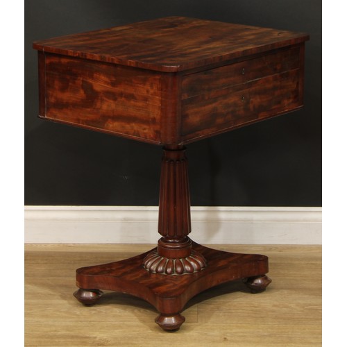 2308 - A William IV mahogany lamp or work table, rounded rectangular top above a deep frieze drawer, turned... 