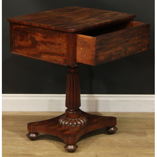 2308 - A William IV mahogany lamp or work table, rounded rectangular top above a deep frieze drawer, turned... 