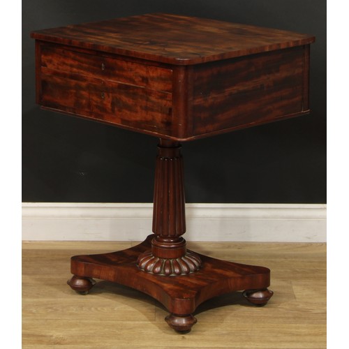 2308 - A William IV mahogany lamp or work table, rounded rectangular top above a deep frieze drawer, turned... 