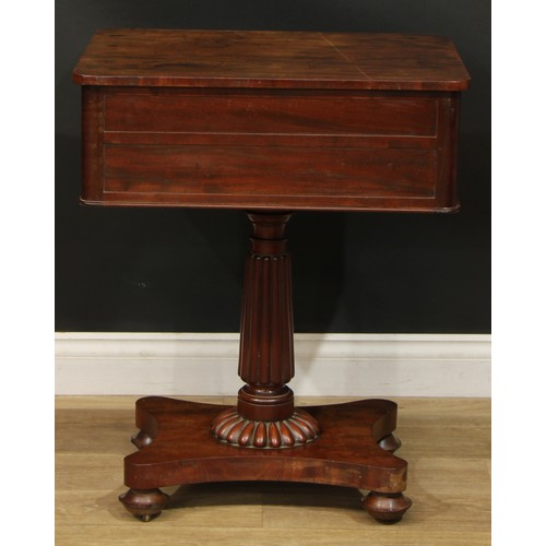 2308 - A William IV mahogany lamp or work table, rounded rectangular top above a deep frieze drawer, turned... 