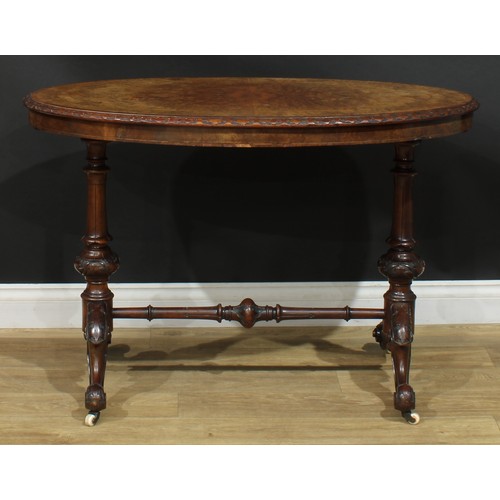 2301 - A Victorian walnut, mahogany and marquetry centre table, rosewood crossbanded oval top with relief c... 