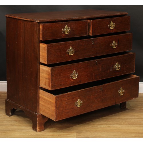 1944 - A George III oak chest, slightly oversailing top above two short and three long graduated cockbeaded... 