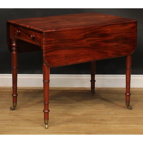 2490 - A George IV mahogany Pembroke table, rounded rectangular top with fall leaves above a single frieze ... 