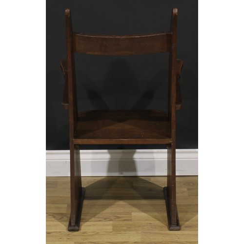 2658 - An Arts & Crafts oak shark-fin chair, 86cm high, 51cm wide, 40.5cm deep, c.1920