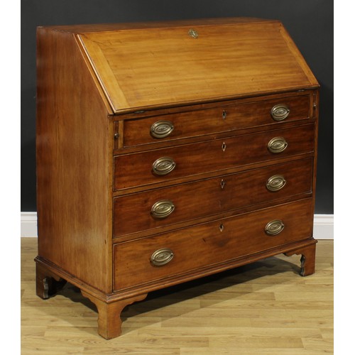 1787 - A George III mahogany bureau, fall front enclosing a fitted interior, above four long graduated cock... 