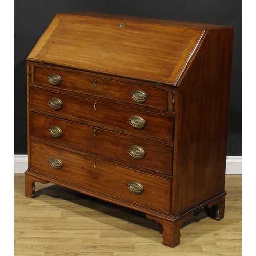 1787 - A George III mahogany bureau, fall front enclosing a fitted interior, above four long graduated cock... 