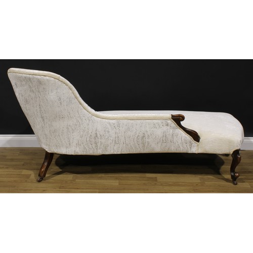 2286 - A Victorian walnut button-back chaise longue, stuffed-over upholstery, carved scroll ends and cabrio... 