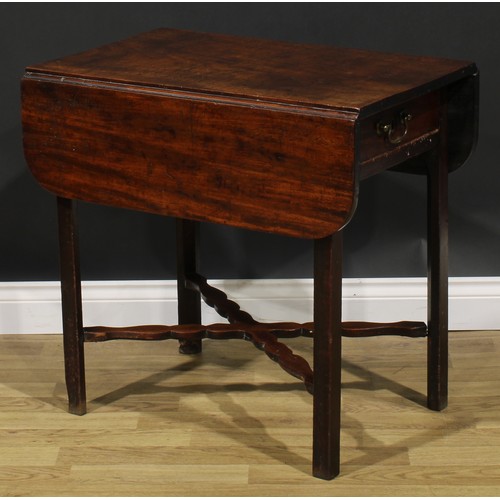 2461 - A George III mahogany Pembroke table, rounded rectangular top with fall leaves above a single frieze... 