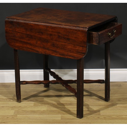 2461 - A George III mahogany Pembroke table, rounded rectangular top with fall leaves above a single frieze... 