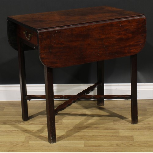 2461 - A George III mahogany Pembroke table, rounded rectangular top with fall leaves above a single frieze... 