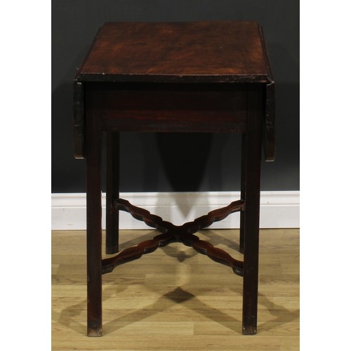 2461 - A George III mahogany Pembroke table, rounded rectangular top with fall leaves above a single frieze... 