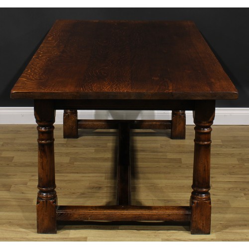 2008 - An 18th century style oak refectory dining table, by Titchmarsh & Goodwin, rectangular top, turned l... 