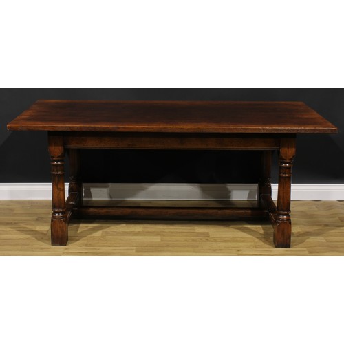 2008 - An 18th century style oak refectory dining table, by Titchmarsh & Goodwin, rectangular top, turned l... 